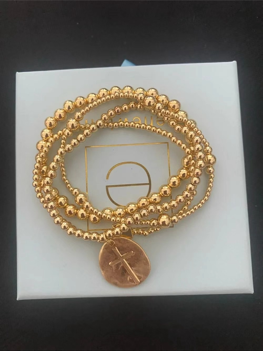 Gold Beaded Multi-Strand Bracelet with Cross Charm